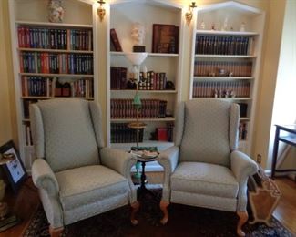 Large Book Collection and Wingback Chairs