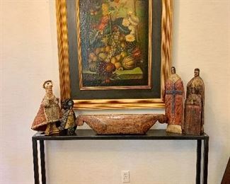 Contemporary narrow iron console & carved religious figural