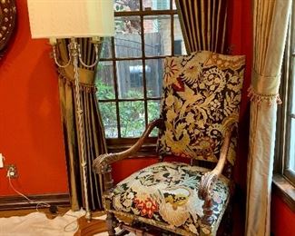Antique armchair with embroidered upholstery 