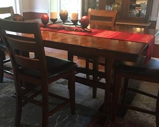 High boy table with 8 chairs and 2 leaves