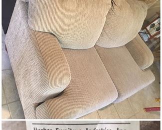 Hughes tan love seat