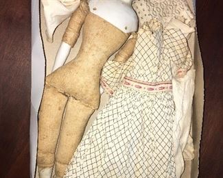 antique porcelain and cloth doll and clothing