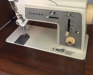 Singer Touch and Sew machine in cabinet