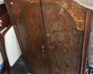 antique cabinet in garage