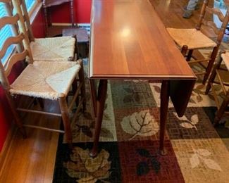 #3		drop side dining table w 6 ladder back chairs  69x19-39x29	 $275.00 
