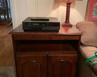 #19		laminate/wood tv cabinet with 2 doors 28x18x30	 $65.00 

