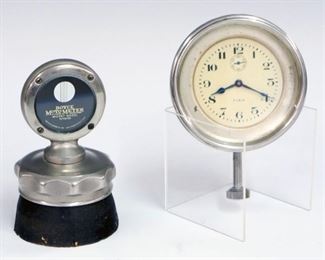 Lot 2: An Early 20th Century Boyce Moto Meter Radiator Cap & an Elgin 8-Day Automobile Clock.  Light wear to each.  Up to 5" high.  