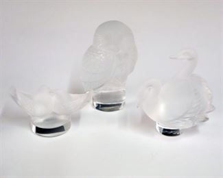 Lot 20: Three Lalique Crystal Birds.  All with etched signature, and one with paper label.  Overall condition is good.  Up to 3 1/2" high.  