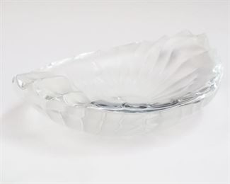 Lot 21: A Lalique Crystal "Nancy Cendier" Cigar Rest.  Frosted and clear glass dish with wavy line motif.  Etched signature "Lalique France".  Very minor wear.  8 1/2" long, 2 1/2" high. 
