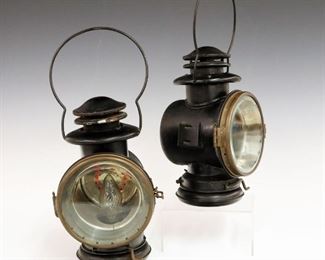 Lot 30:  A Pair of Turn of the Century Lanterns.  Marked "C.T. Ham Mfg. Co. Rochester N.Y. U.S.A." at the underside; electrified.  Wear to each, some paint loss.  13" high (to the handle).