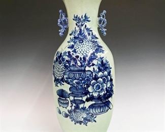 Lot 52 - A 20th Century Chinese Baluster Vase.  Blue on celadon vase with flowering urn motif.  Minor wear, handle reattached.  22 1/2" high. 