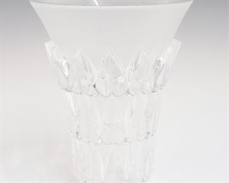 Lot 10: A Lalique Crystal "Feuilles" Vase.  Frosted and clear crystal tapered vase with repetitive leaf motif.  Etched signature "Lalique France".  Appears to be in good condition.  7 1/4" high.