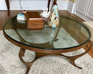 Metal coffee table with beveled glass top