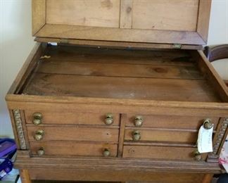 #13 Antique oak 6 drawer printer desk that has been modified 33x24x35 $200.00