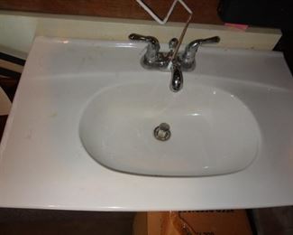 BATHROOM SINK AND FAUCET 