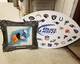 Metal Pabst and Bud Light Signs
