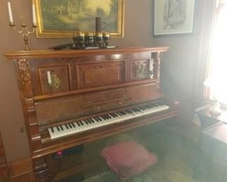 Antique piano converted to CD player piano