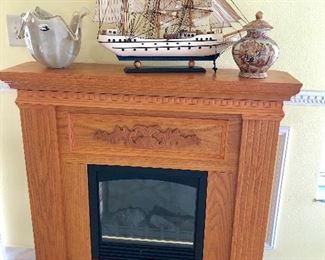 Fireplace w/Oak Finish and Decorative Wood Detail- $65 - (38W 10D 40H)