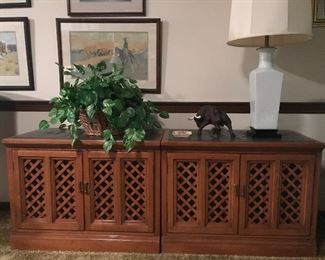 Matching bookcases. Remington Western prints behind the book cases.