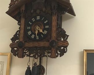 Antique coo coo clock with quail and coo coo. American Clock company, circa 1900-1920. Cuckoo announces hour, quail announces quarter hour