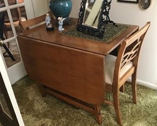 Nice drop leaf table with 4 chairs