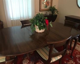 Mahogany table and chairs extra leaves