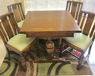 Antique English drop-under Tiger Oak pub table and chairs