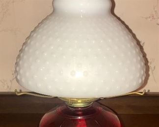 Vintage ruby oil lamp with hobnail milk glass shade 