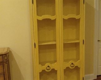 Yellow display/towel cabinet