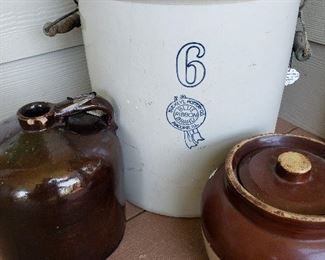 Several stoneware crocs