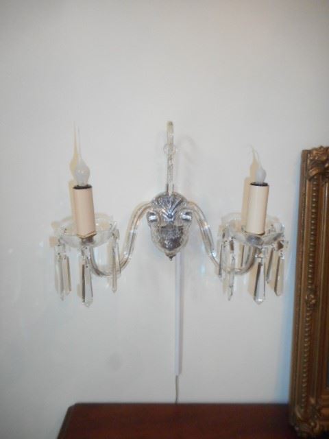 Pair of crystal sconces, easily detached, and are wired  for immediate  use.