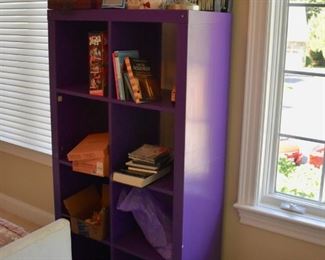 Purple cubby style shelf