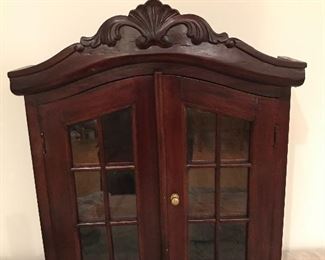 Hanging glass front cabinet