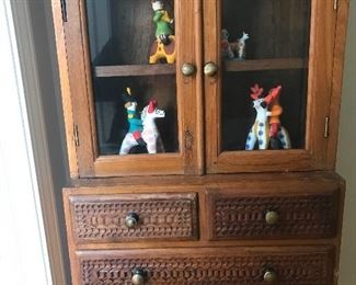Small carved cabinet