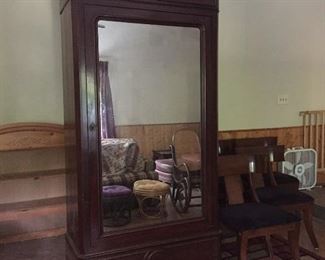 Armoire with shelves and 2 drawers.