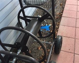 Water hose reel cart with basket