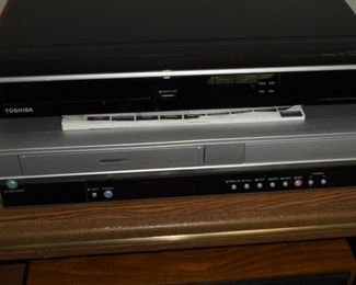 Toshiba DVD player on top and Toshiba VHS player & recorder on bottom