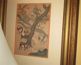 A  wonderful Asian print  of wild horses in a matted and gilded frame done by Friedman's art for over $400.00.