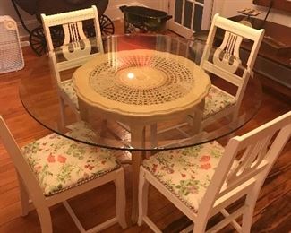 Gorgeous glass top dining table . Antique harp / lyre chairs