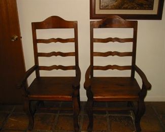 two wooden chairs