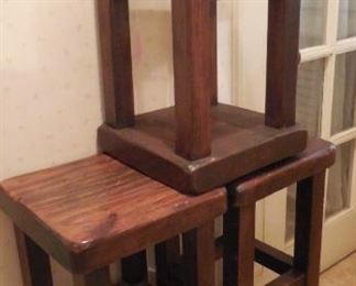 bar stools, three of them