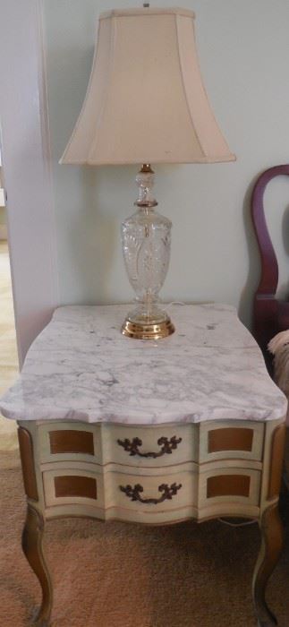 Marble top French Provincial end table .  There are two