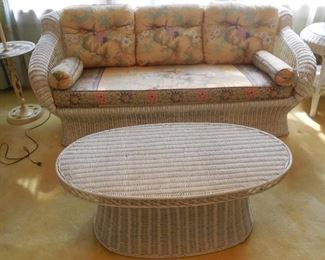 Wicker sofa and cocktail table