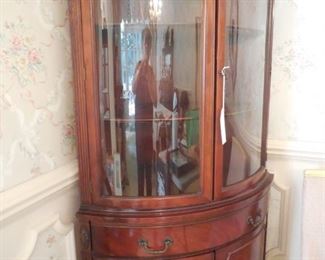 Pair of Mahogany curved door and glass corner curio cabinets