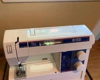 Viking Husqvarna 230 electronic sewing machine w/sewing cabinet