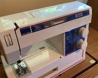 Viking Husqvarna 230 electronic sewing machine w/sewing cabinet