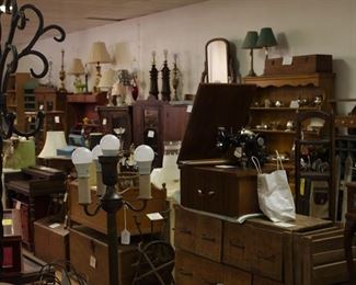 Large selection of furniture items, coat racks, floor lamps, table lamps a couple of sewing machines
