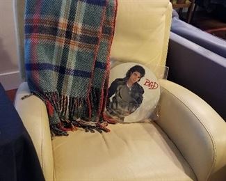 this butter soft yellow recliner chair is a match to the sectional leather couch