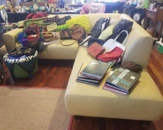 very nice sectional in soft yellow. check out the vintage purses Coach, Dooney & Bourke, several Italian leather ones