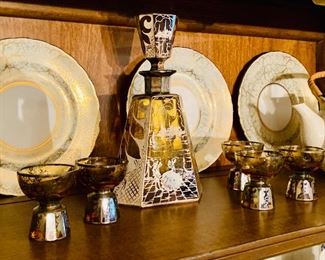 Vintage Amber/Sterling Spaniard Scene decanter set is only $175 plus tax